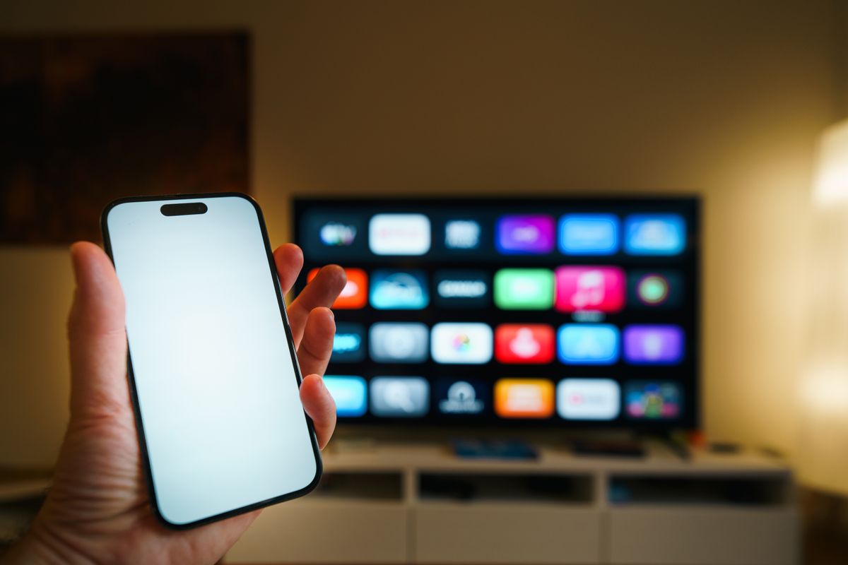 Smart TV displaying streaming apps in a modern living room